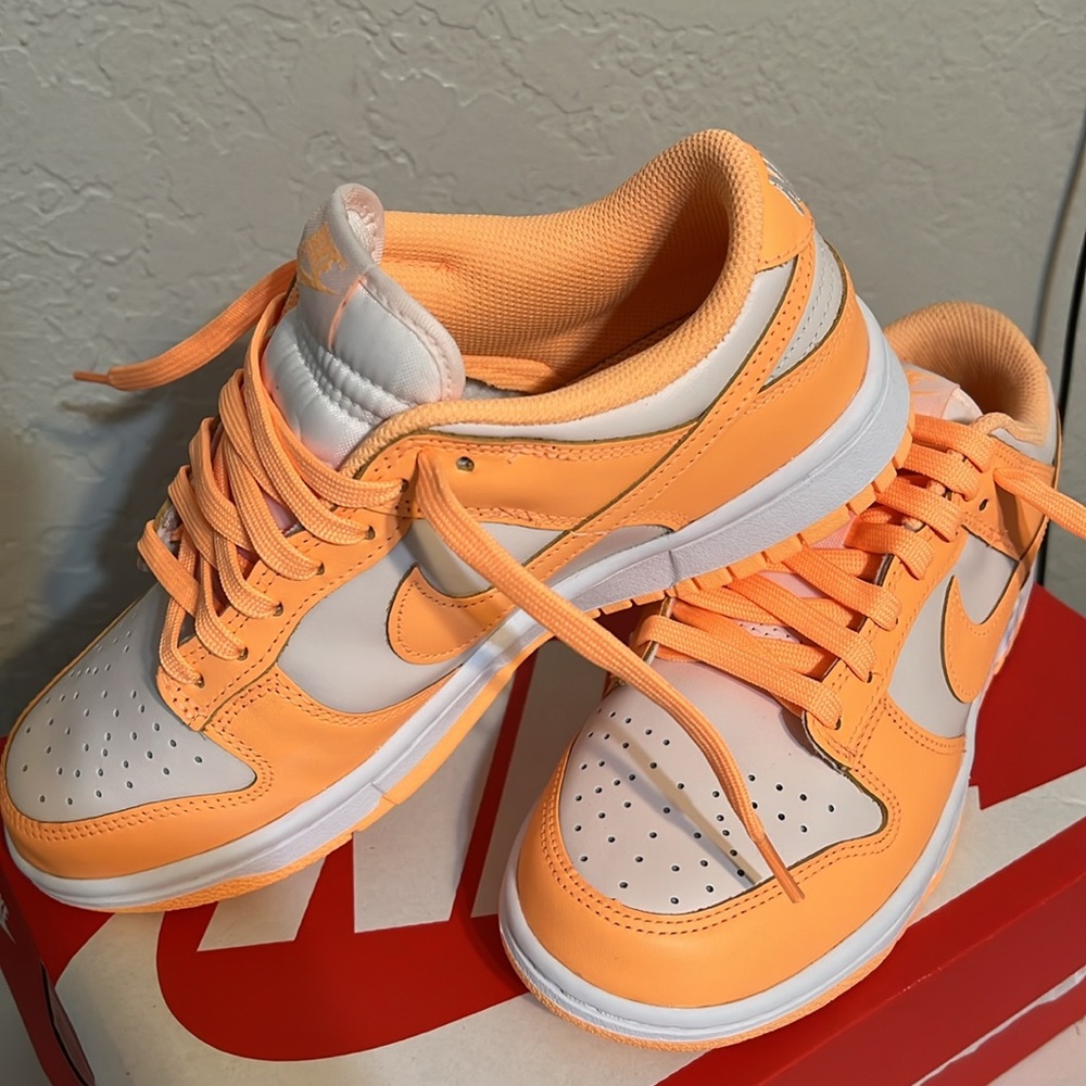 Brand new women’s 7.5 peach cream Nike dunks.